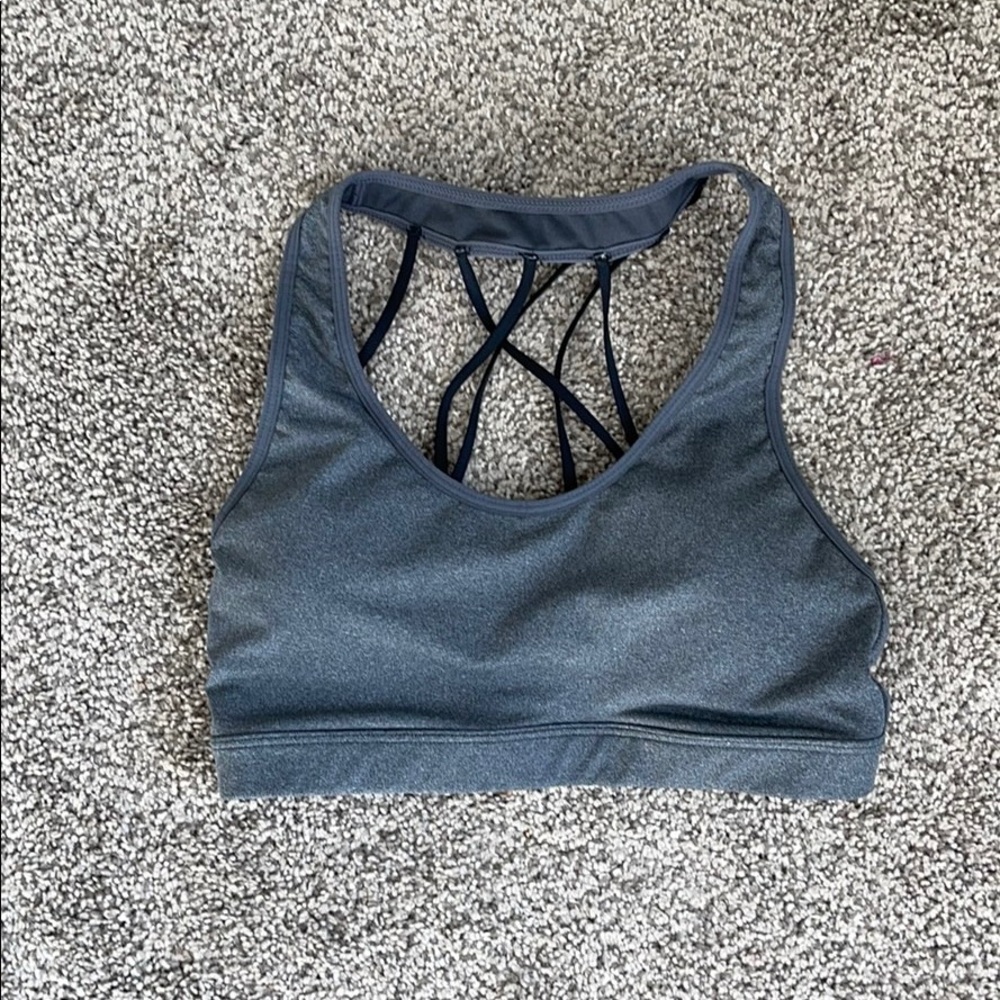 Gray sports bra with strappy back.